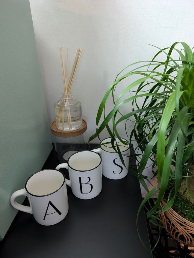 Aspen Brooke Studio branded decorative mugs with ABS letters