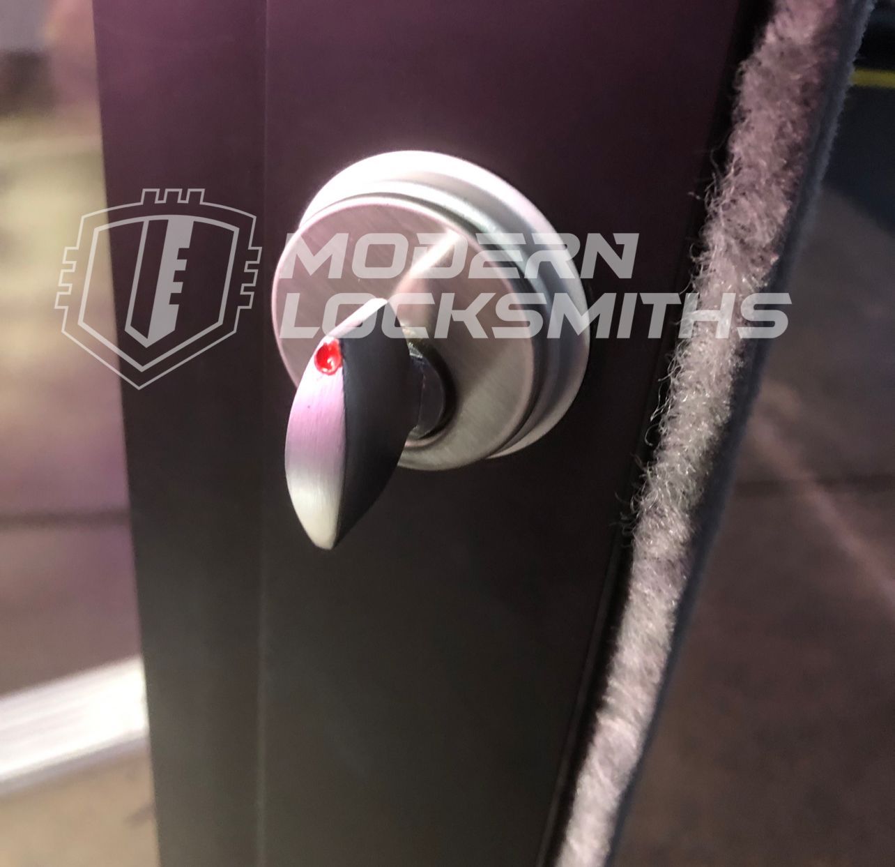 A storefront door thumb-turn lock