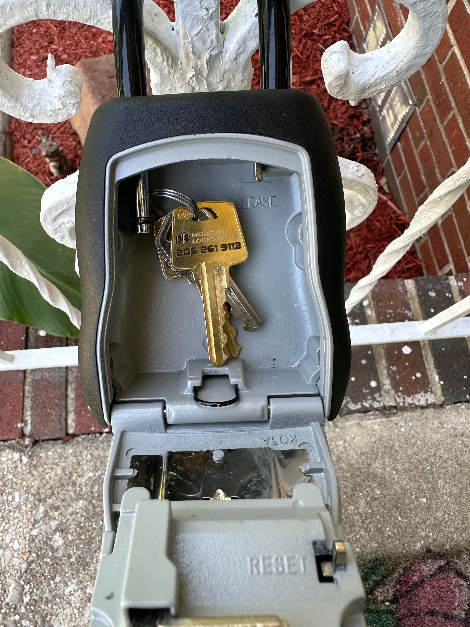 a lockbox unlocked with a key inside