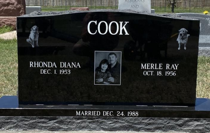 Black granite grave marker for the Cook family with two portrait plaques and names RHONDA DIANA and MERLE RAY