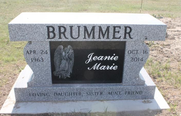 Brummer gravestone with Jeanie Marie plaque and dates, in a cemetery.