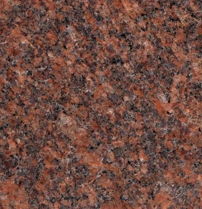 Close-up of reddish-brown granite with black and gray speckles