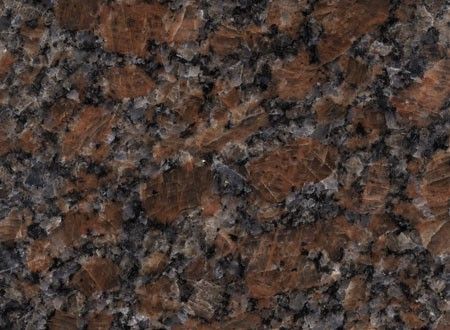 Brown and black speckled granite surface texture