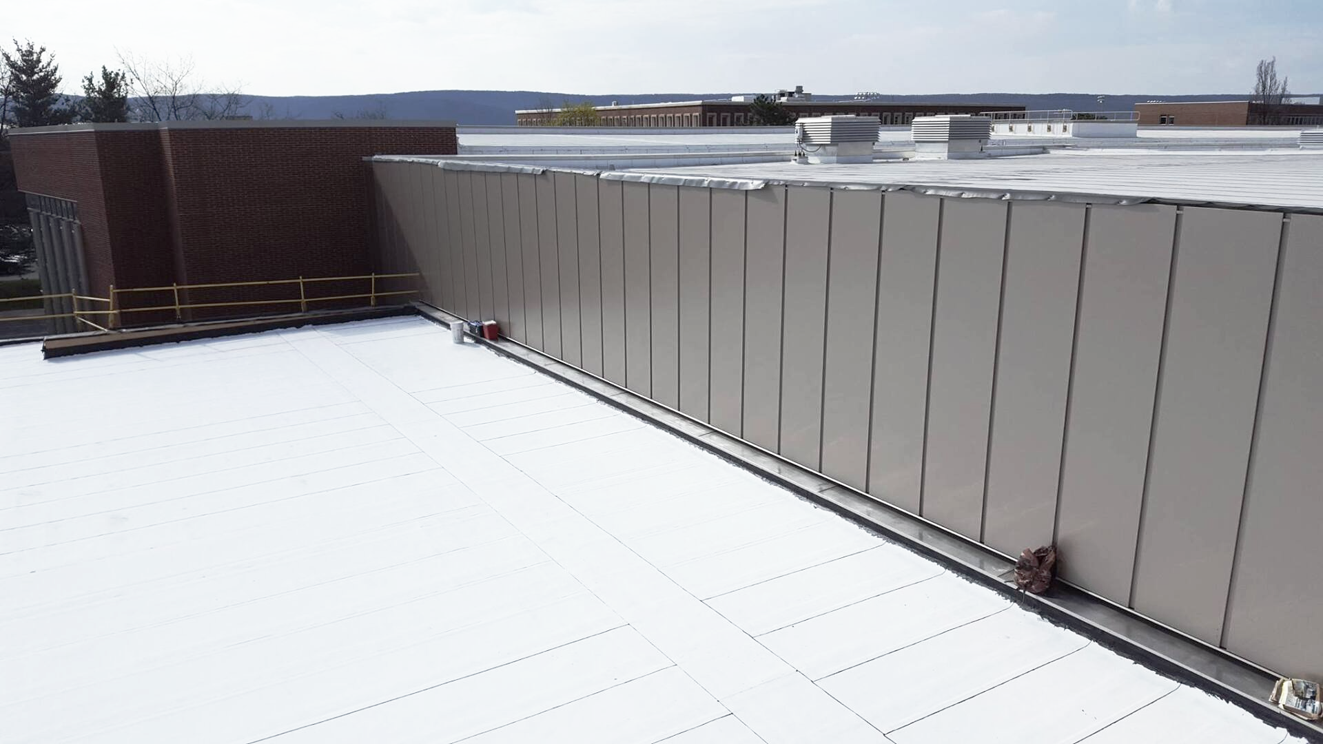 Commercial roofing systems work