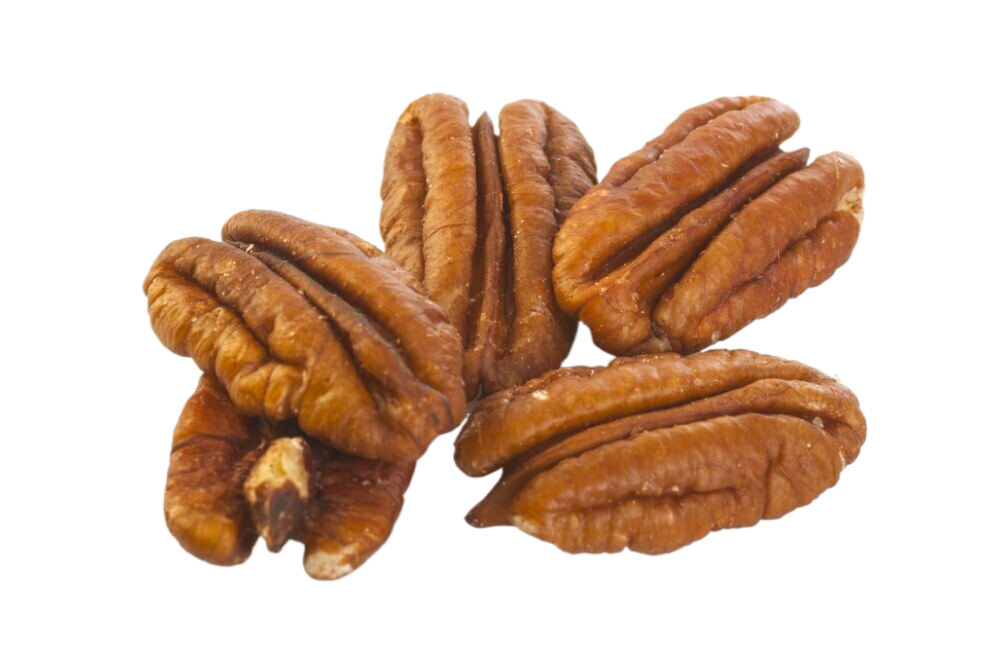 A pile of pecans on a white surface