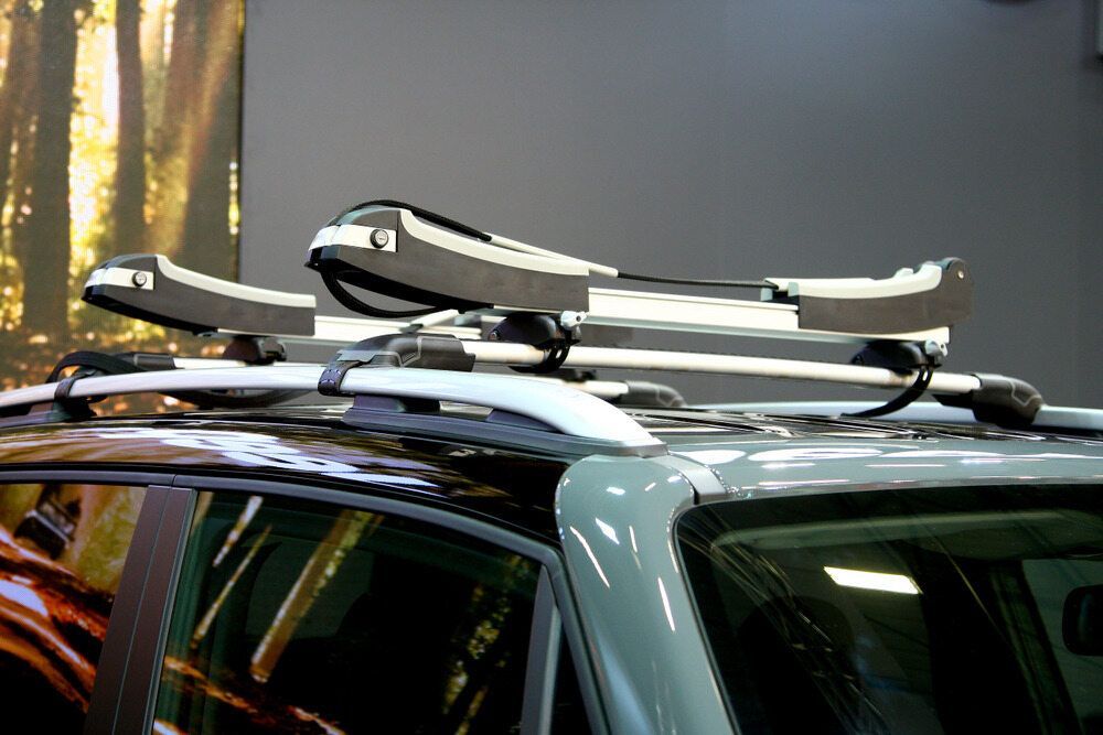 A Car With Two Kayaks on the Roof Rack — GZM 4x4 Performance In Gold Coast, NSW