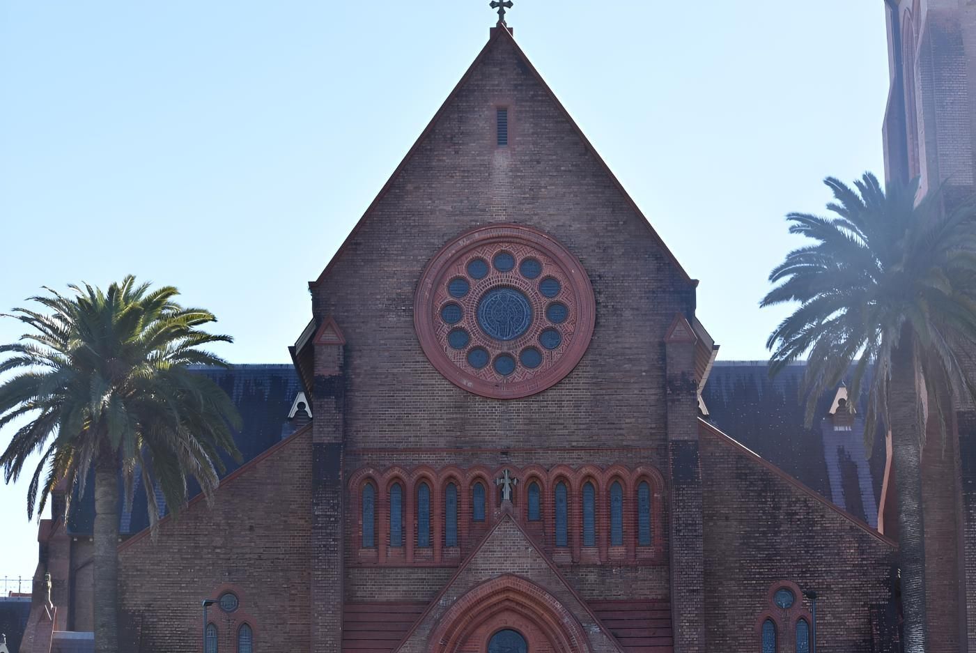 Large Brick Church With Palm Trees in Front of It — GZM 4x4 Performance In Lismore, NSW