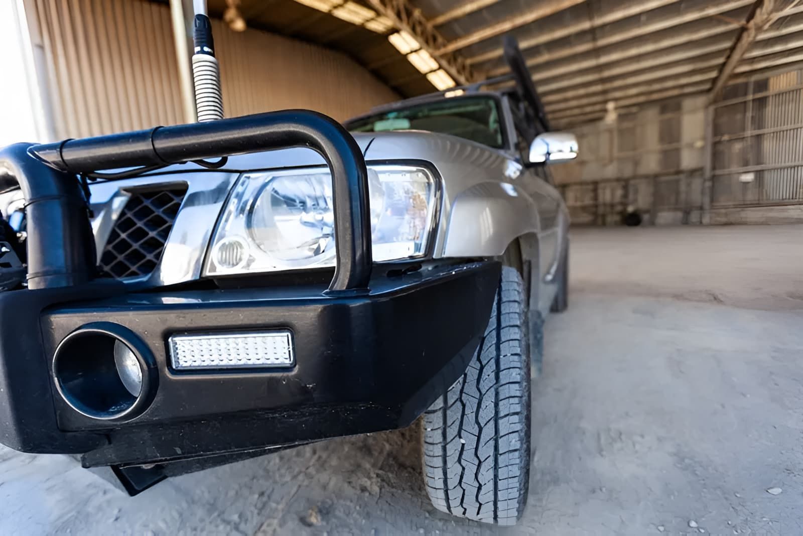 A Grey 4x4 Vehicle Inside a Large Shed — GZM 4x4 Performance In Ballina, NSW