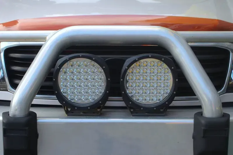 A Close Up of the Front of a Car With Lights on It — GZM 4x4 Performance In Gold Coast, NSW