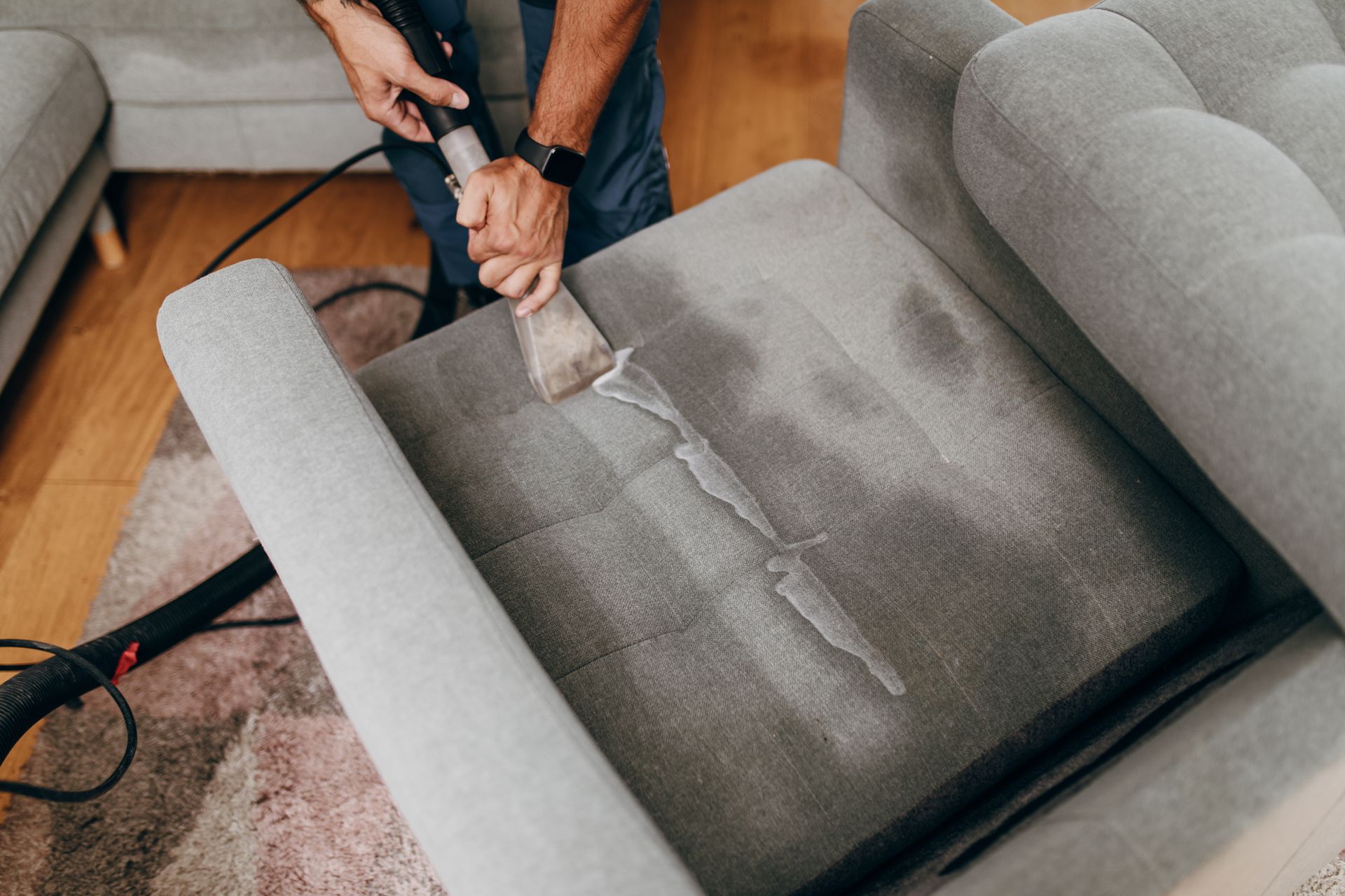 Deep sofa cleaning showcasing professional upholstery cleaning removing dirt and stains.