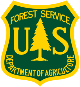 The logo for the forest service department of agriculture