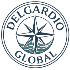 Delgadio Global circular logo with compass over stylized waves in blue and green