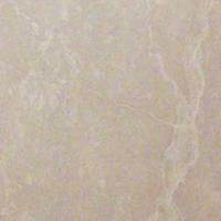 Et nærbillede af en beige flise med marmortekstur.