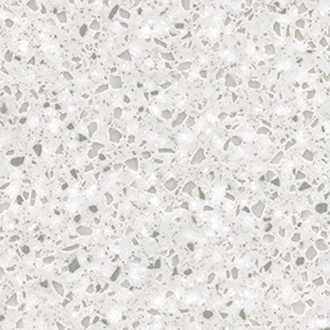 Et nærbillede af en hvid terrazzo bordplade.