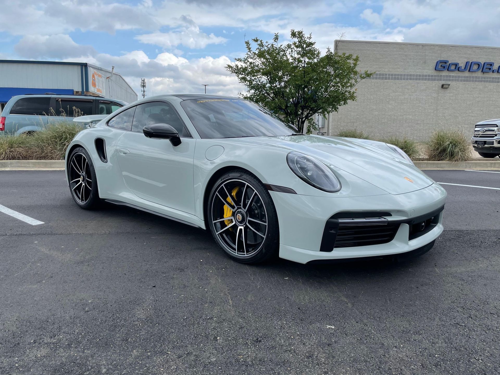 Porsche 911 Turbo S finished with paint protection film and accessories at Auto Trim Designs & Tint in Pearl, MS