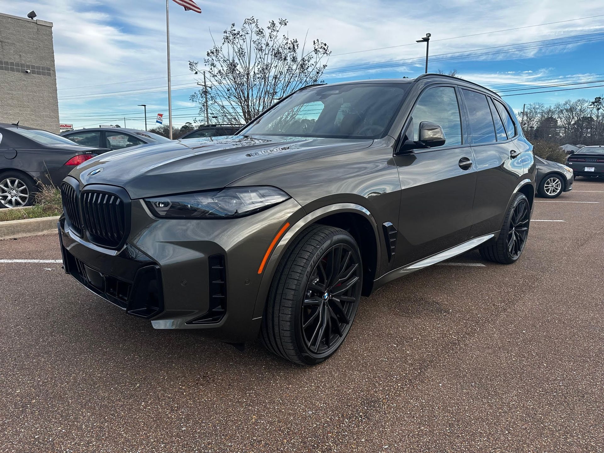 2025 BMW X5 finished with Xpel paint protection film at Auto Trim Designs & Tint in Pearl, MS.