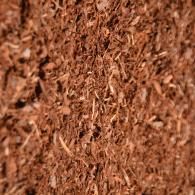 Close-up of brown fibrous material with a rough, tangled texture