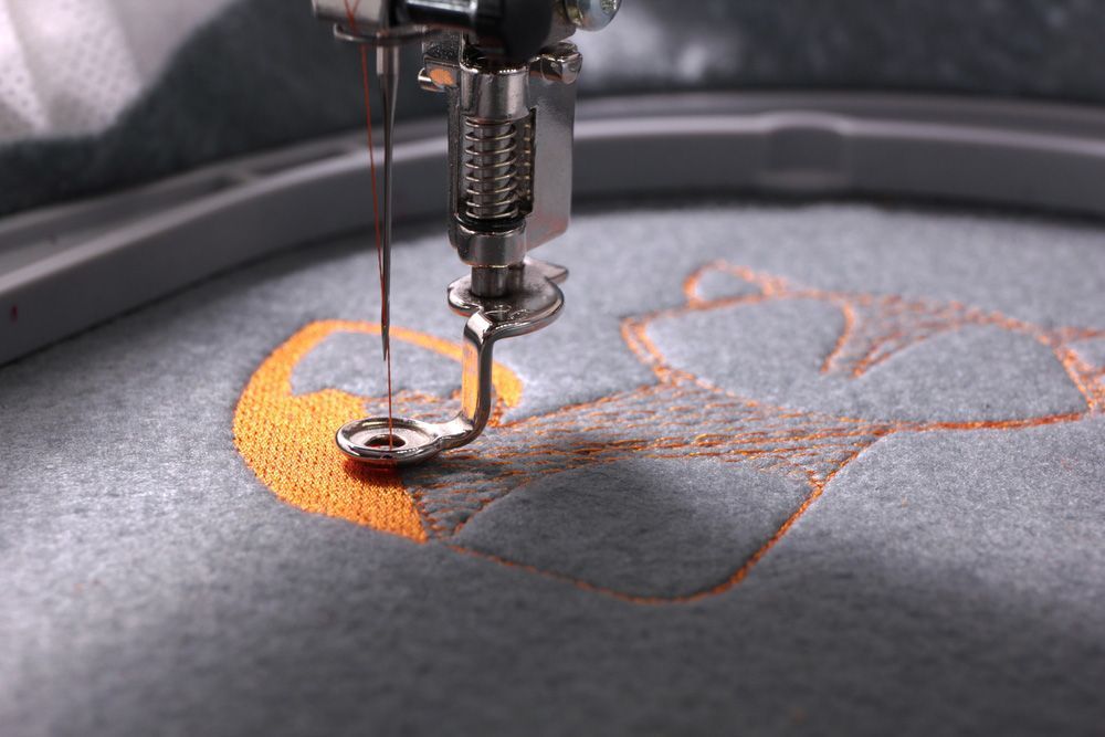 A Close Up of a Sewing Machine Embroidery on a Piece of Fabric — Embroidery Express in Nambour, QLD