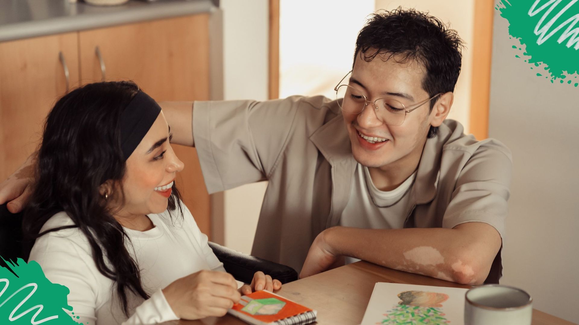Registered NDIS provider support worker and participant smiling.