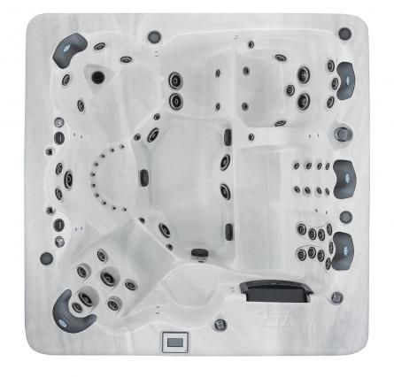 Top-down view of a white square spa tub with multiple black jets and molded seats.