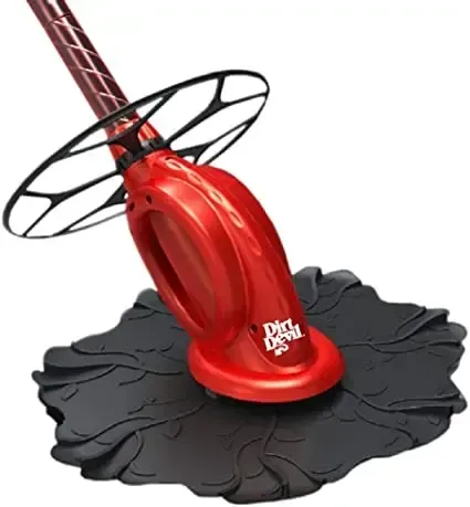 Red rotary lawn mower on a black flower-shaped cutting mat