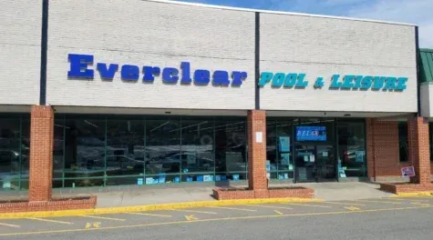 Everclean Pool & Leisure storefront with blue sign and glass windows in a strip mall