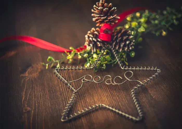 Metal star ornament that spells 