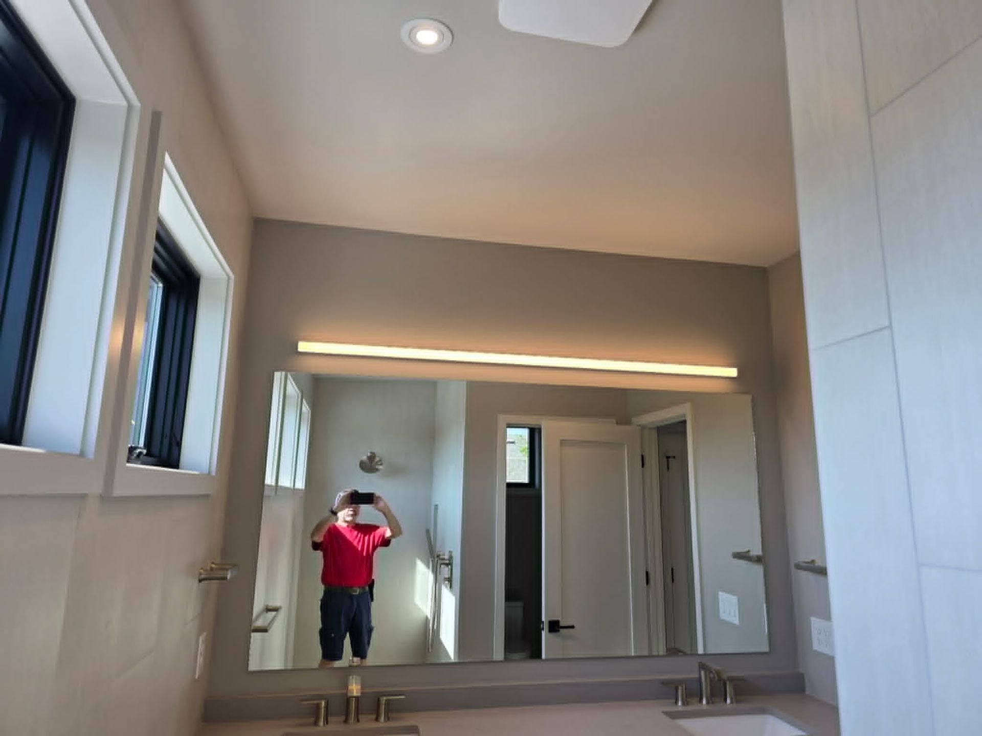 Bathroom light fixtures installation by Shoreline Electric of KDH Outer Banks, NC