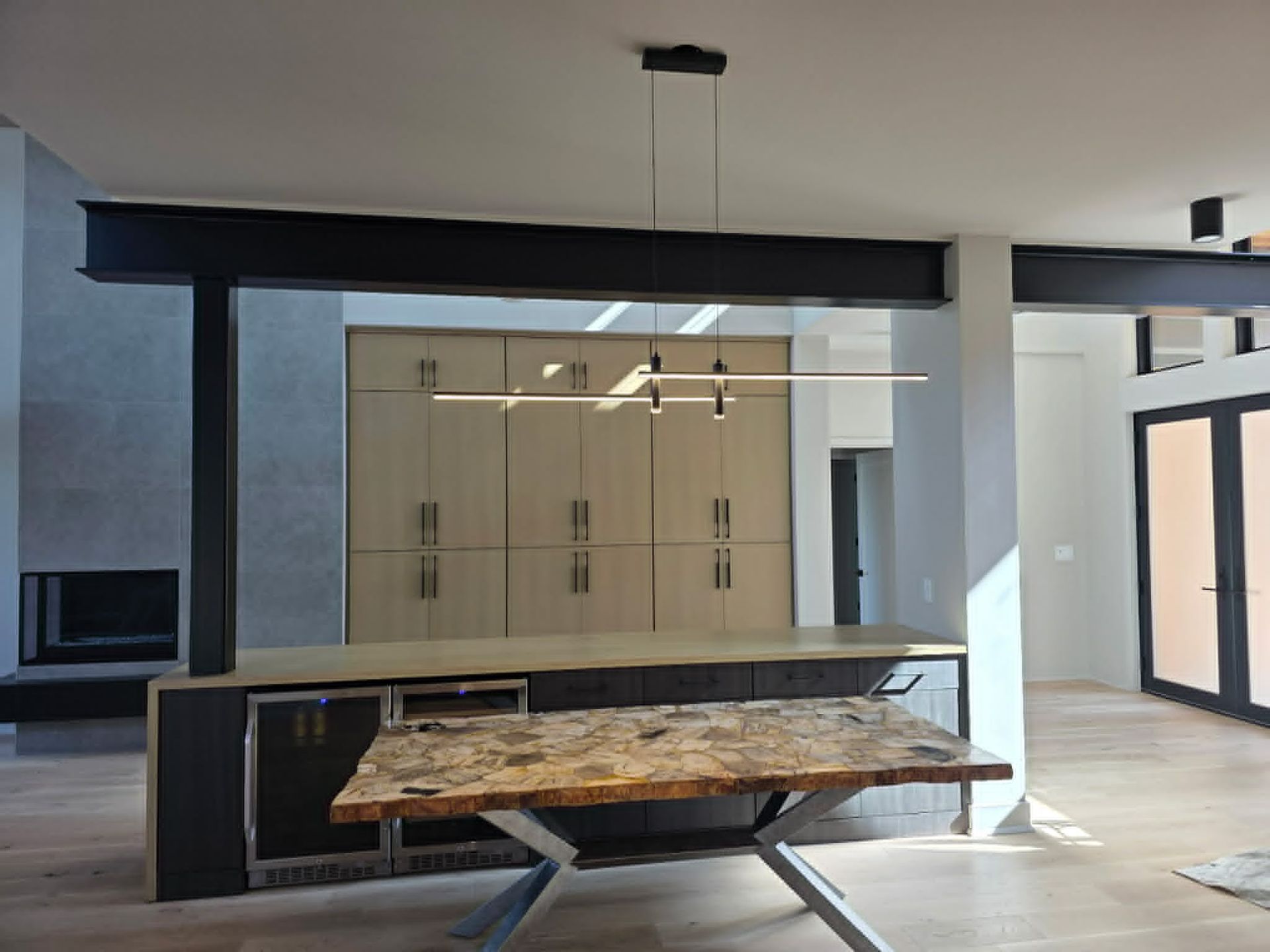Contemporary dining-room lighting installed by Shoreline Electric of KDH Outer Banks, NC
