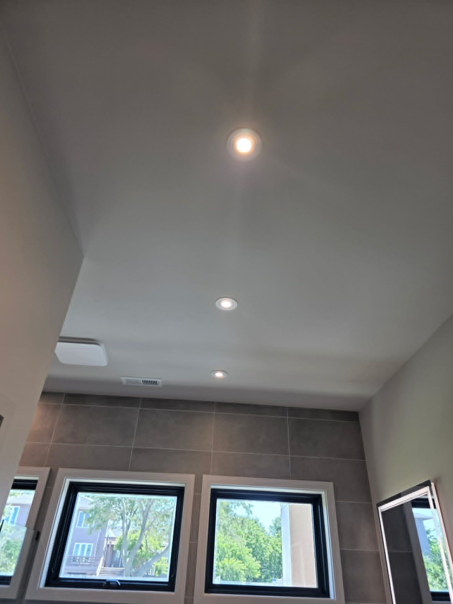 Custom pendant lighting beneath a wood ceiling in Southern Shores, NCinstallation OBX by Shoreline Electric of KDH Outer Banks, NC