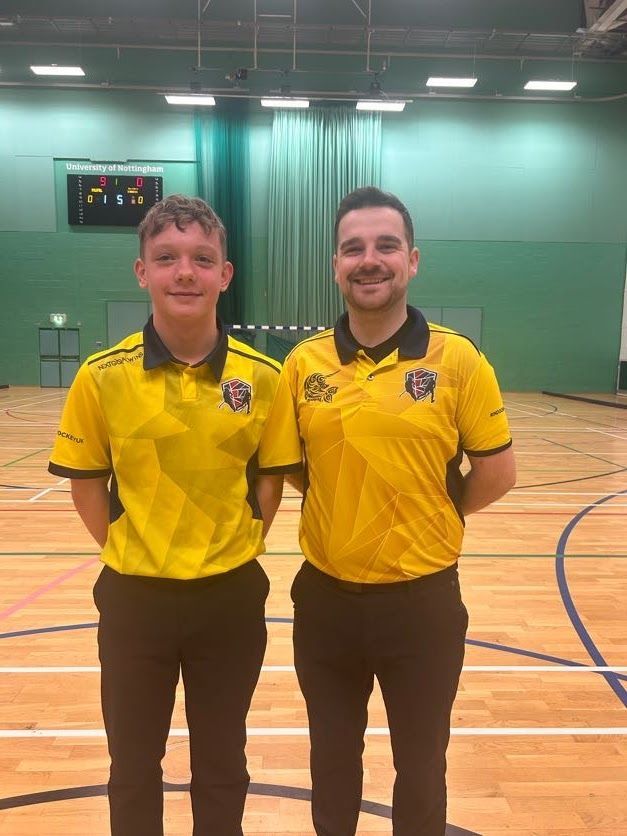 Two umpires standing together
