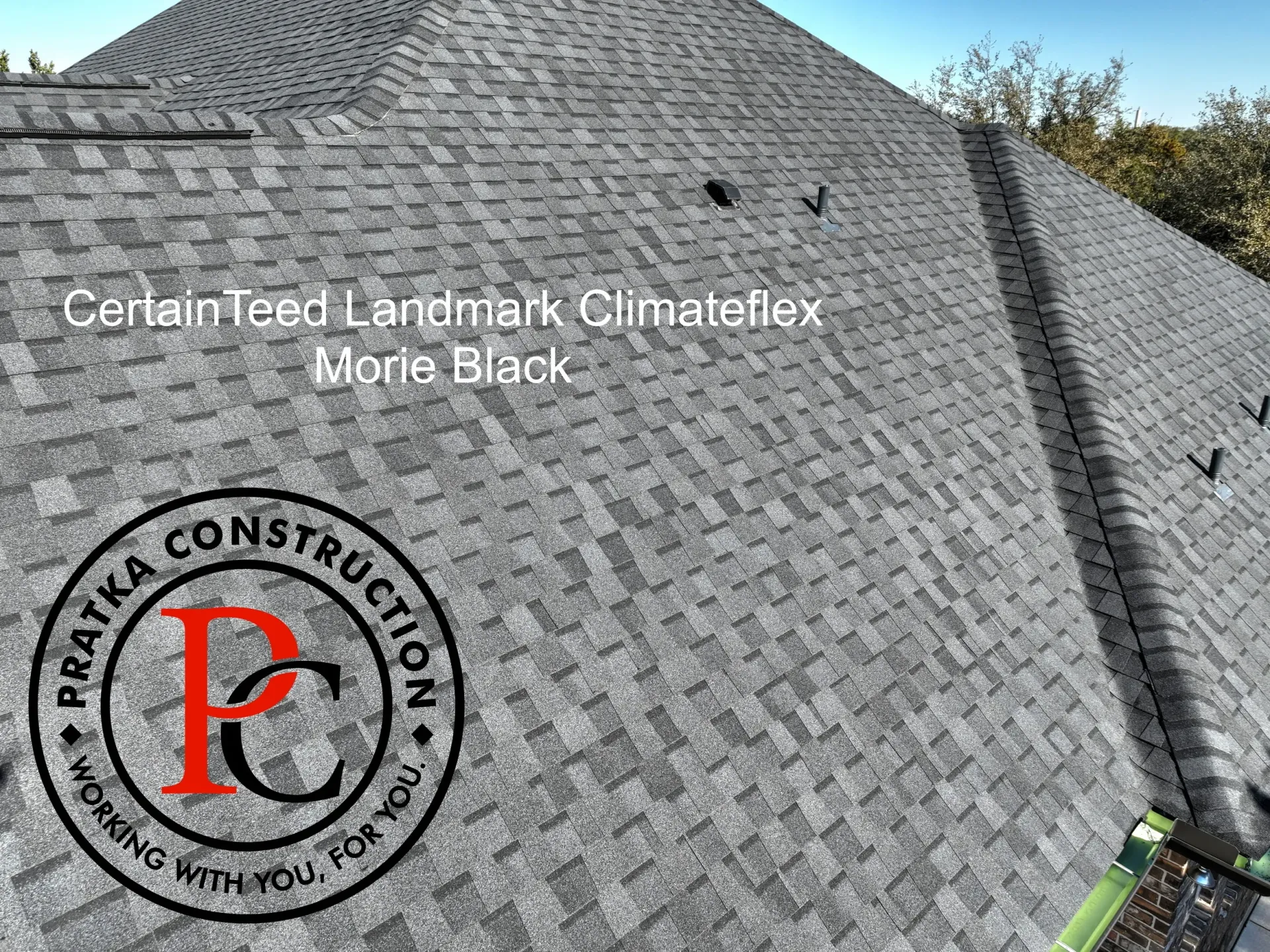 Roof covered with gray CertainTeed Landmark Climateflex shingles, installed by Pratka Construction.