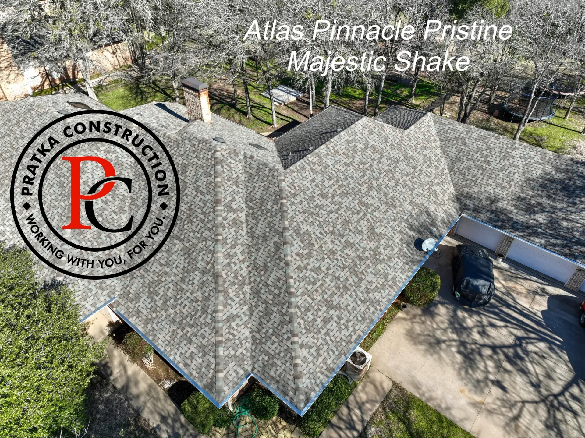 Aerial view of house with new Majestic Shake roofing by Pratka Construction.