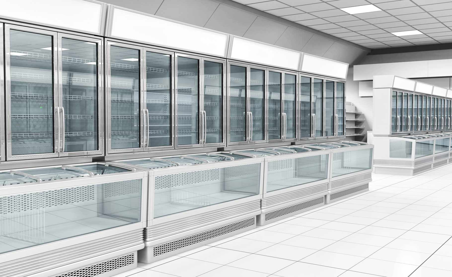 A row of refrigerators with glass doors in a supermarket.