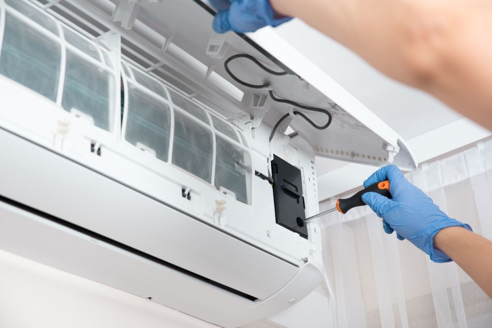 Servicing Air Conditioner — Brod’s Refrigeration & Air Conditioning in Terramungamine, NSW