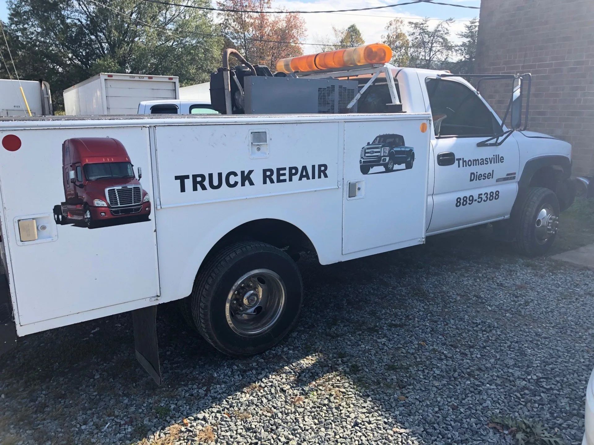 A white truck parked on the gravel — Thomasville, NC — Thomasville Diesel