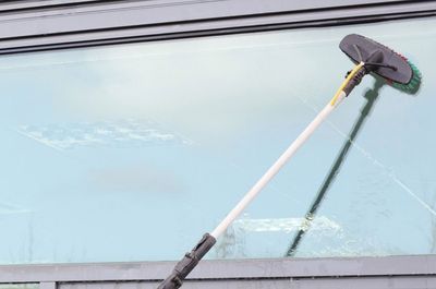 Window cleaner using the water fed pole system, also called reach and wash