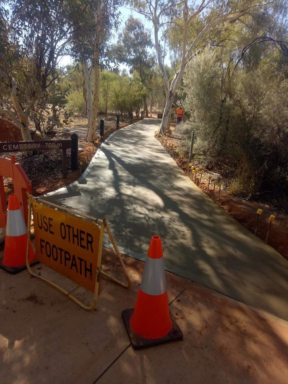 A Sign That Says Use Other Footpath On It — Heartland Concrete In Gillen, NT