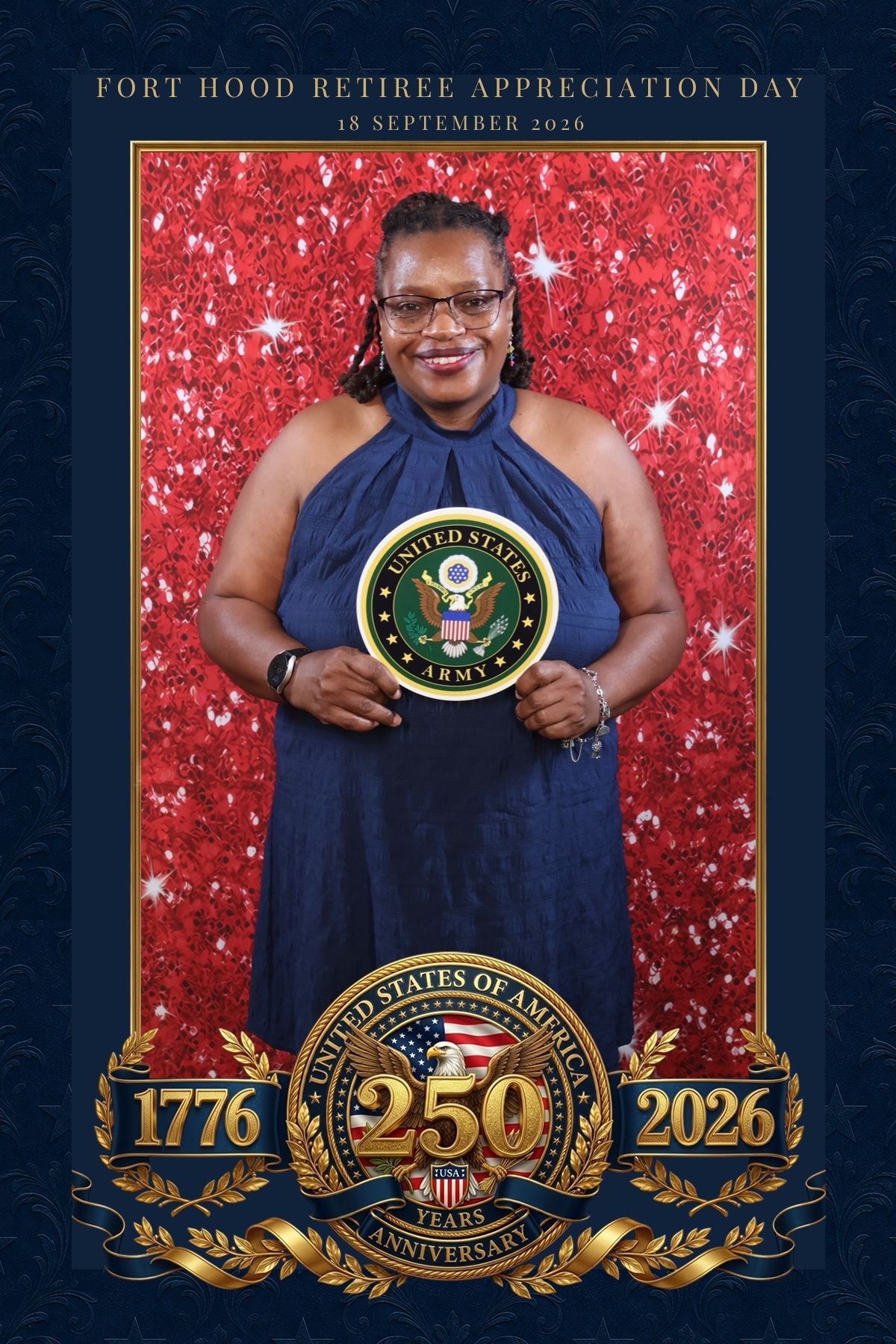 Black guest holding an Army service prop at the Fort Hood Retiree Appreciation Day photo booth
