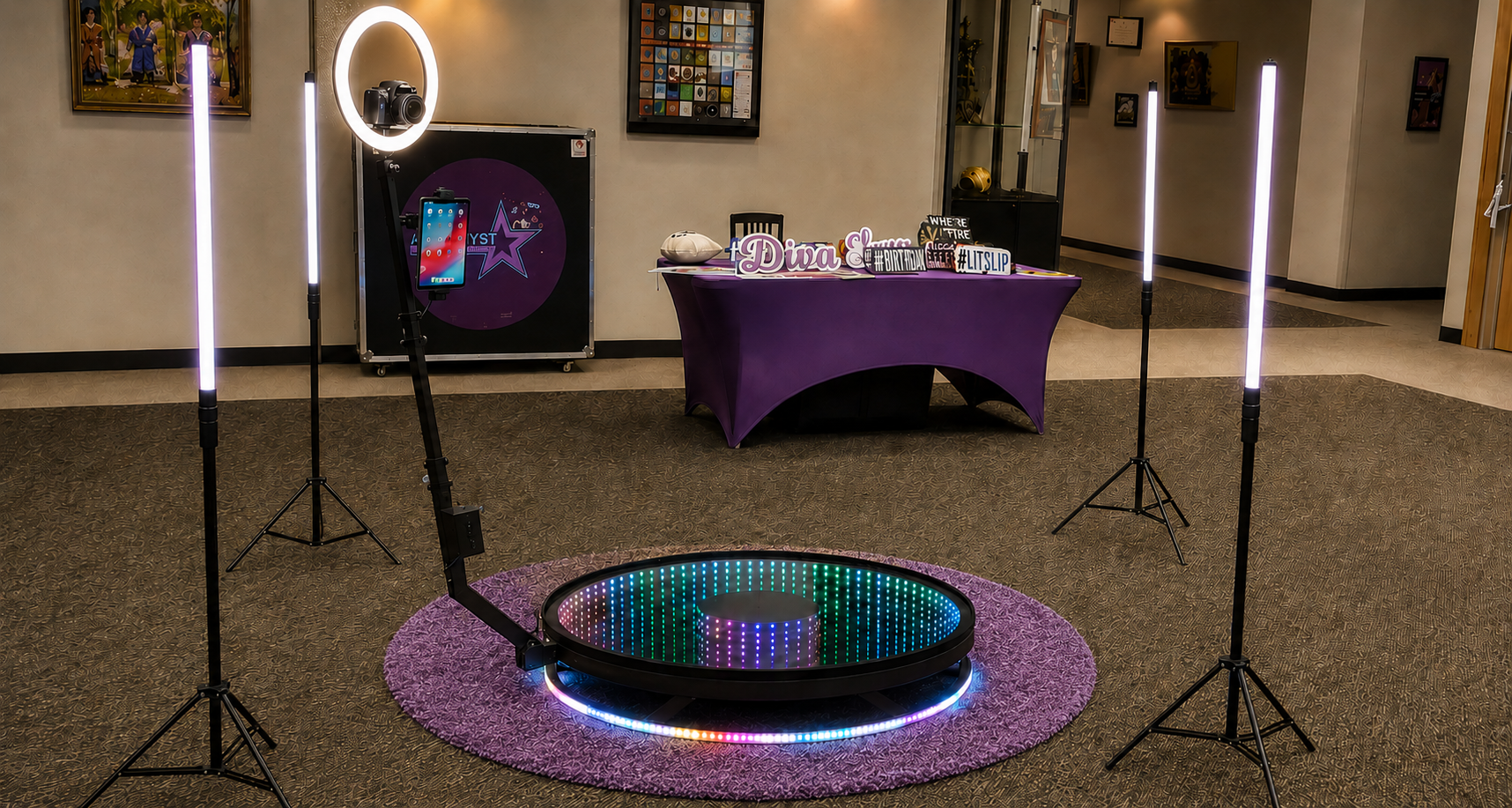 360 video booth setup with purple carpet and LED light sticks from Amethyst Star Ventures in Central Texas