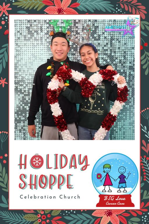 Holiday Shoppe poster with smiling couple holding a large heart-shaped candy cane wreath.