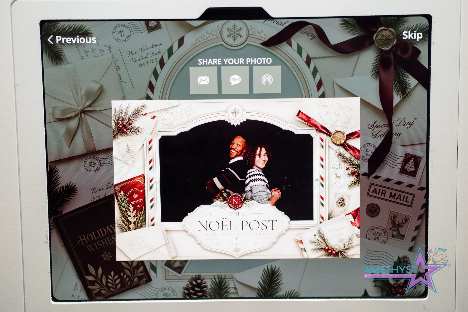 Person in formalwear framed by holiday decorations with “NOT PAST” text on a festive card-themed screen