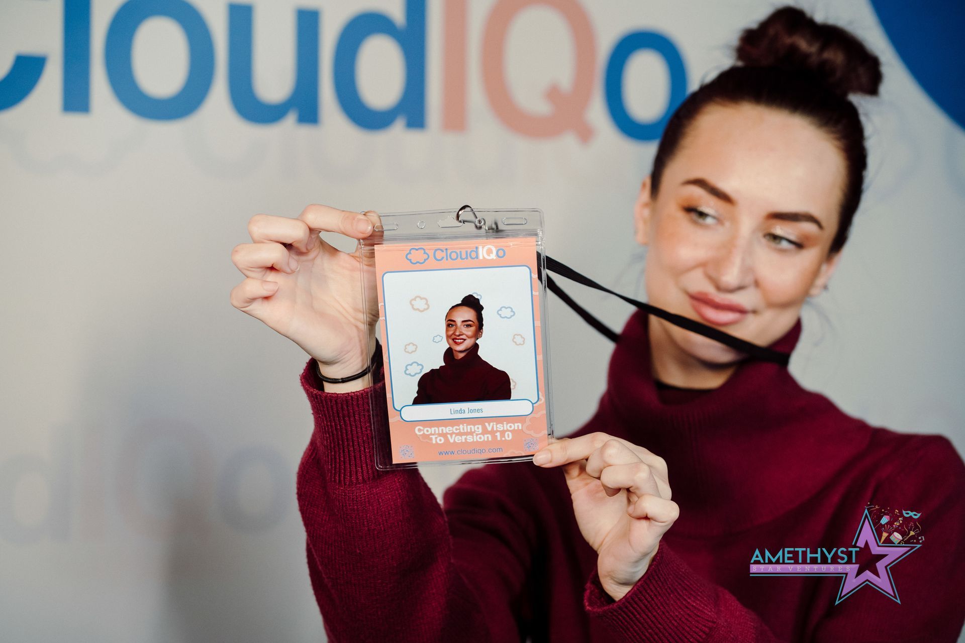 Guest displaying a personalized name badge created during a corporate activation