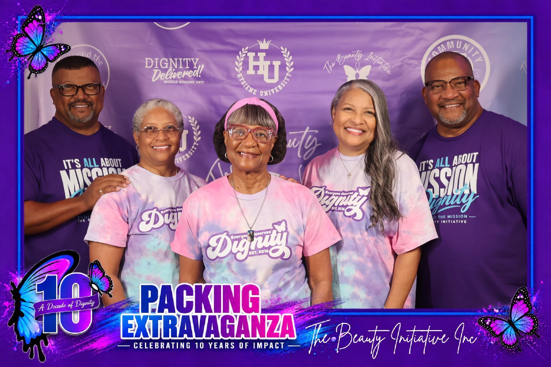 Adult volunteers in a branded group photo layout for the Beauty Initiative Packing Extravaganza in Central Texas
