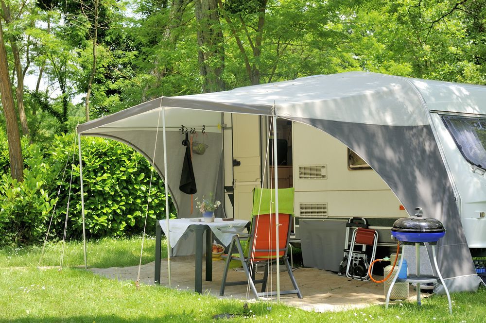 Trailer With Awning, Table, Chairs, and Grill — Darren's Caravan Repairs in Warners Bay, NSW