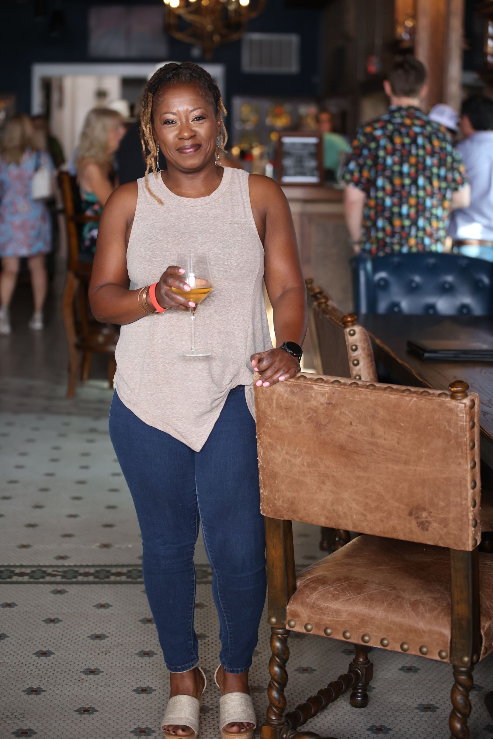 Woman standing in The Eagle in downtown Texarkana during Main Street Texarkana's Progressive Dinner
