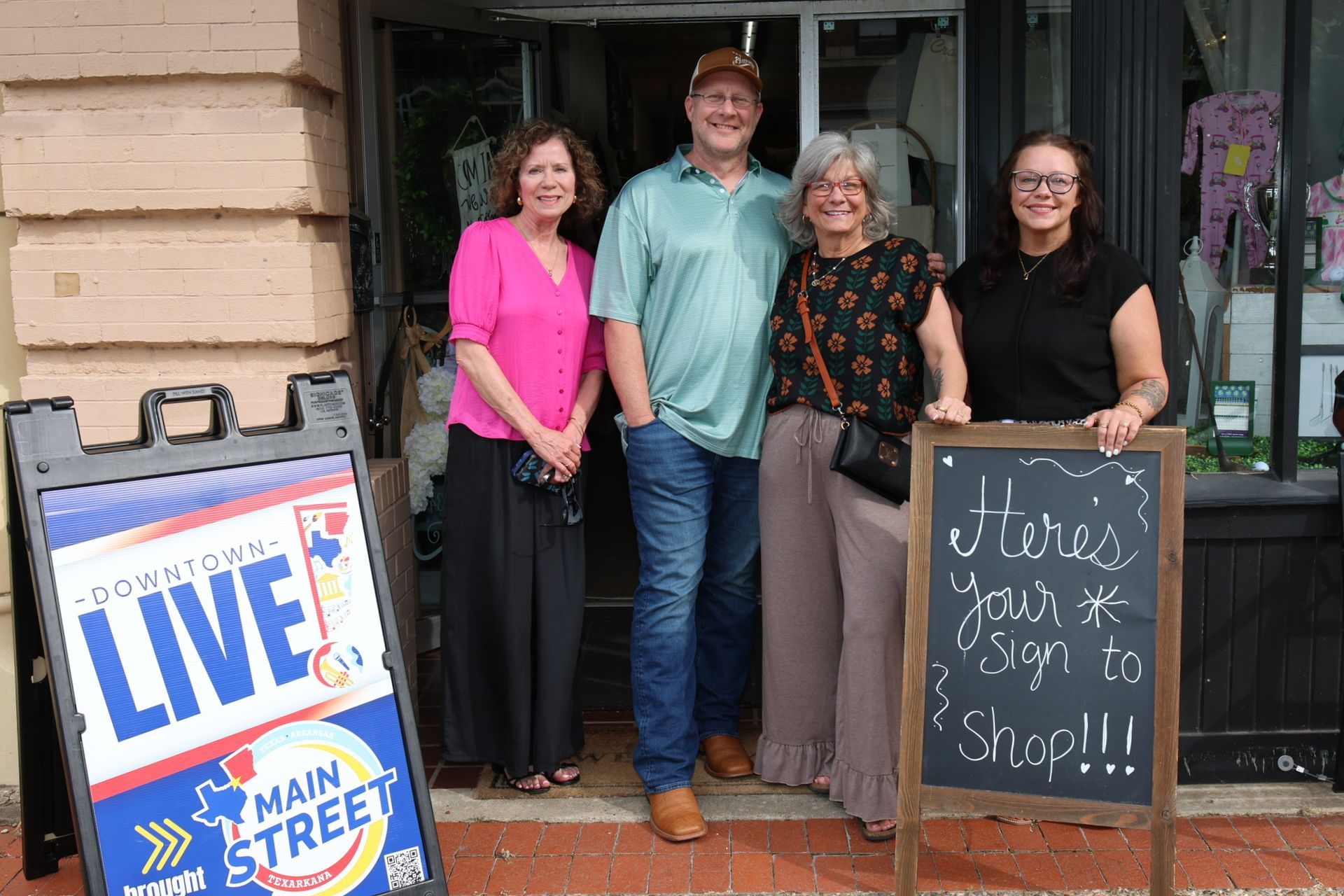 Southern Grace Boutique owners with Main Street Texarkana Executive Director during Downtown LIVE