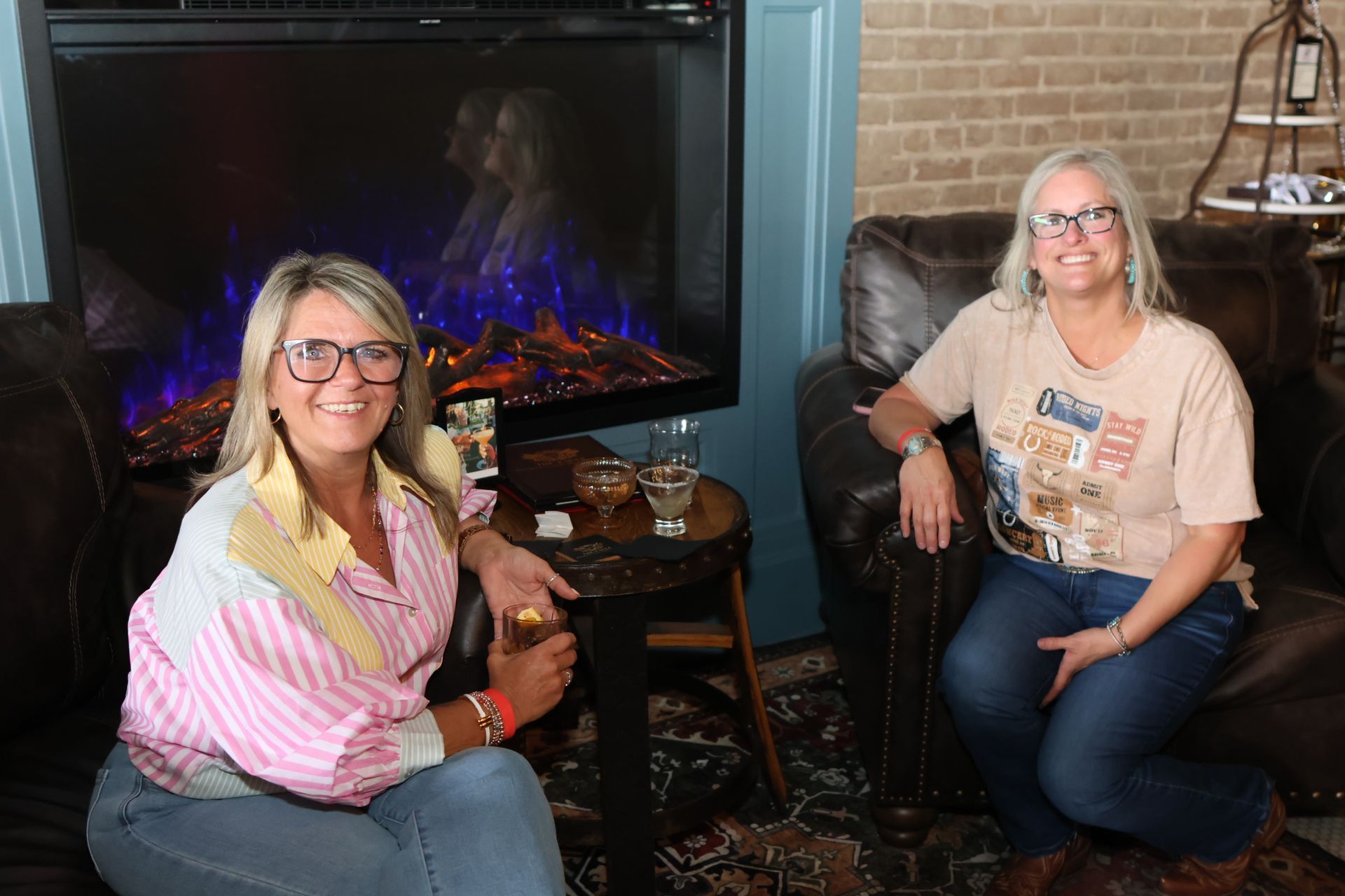 Smiling friends at The Eagle during Main Street Texarkana's Progressive Dinner