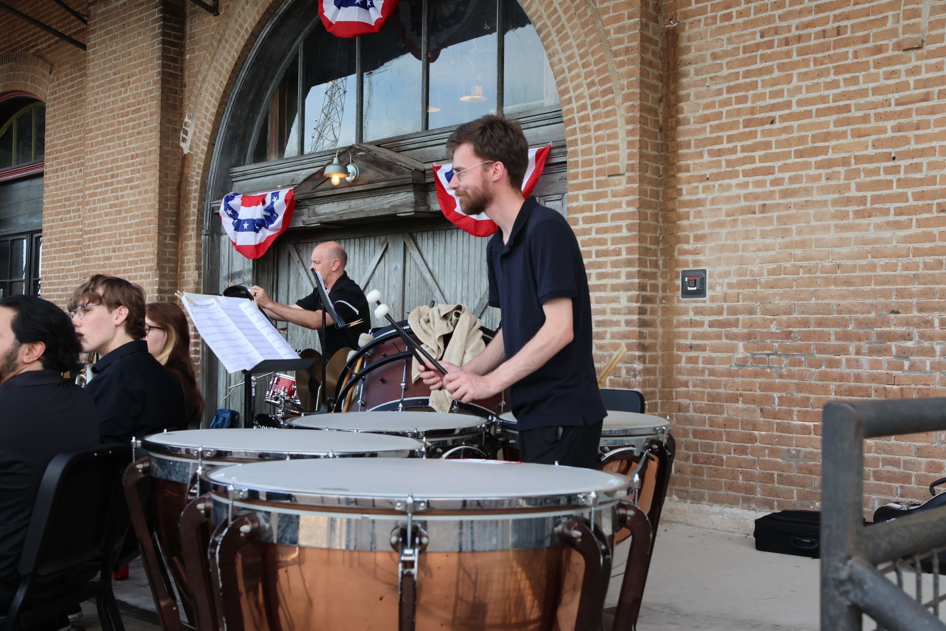 Percussionist playing timpani in downtown Texarkana during Main Street's Downtown LIVE.