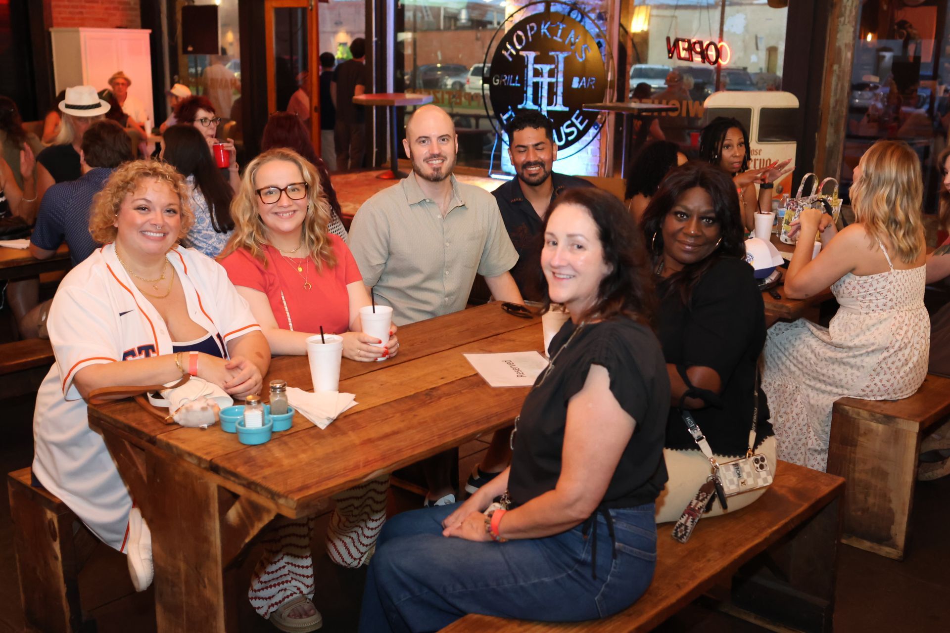 Group of six at Hopkin's Ice House during Main Street Texarkana's Progressive Dinner